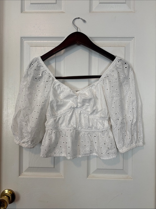 a new day Tops - Beautiful and Feminine White Eyelet Peplum Puff Sleeve Top. Size XS- A New Day